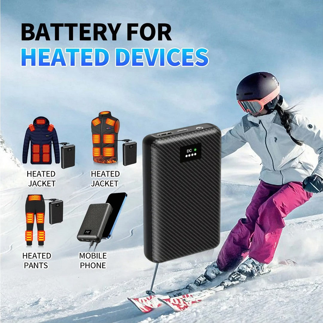 Battery pack for heated devices like jackets, vests, and pants, shown in a winter outdoor setting with skiing gear.