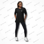 Female model in black Cool-Fit Quick-Dry Athletic Tee Shirt paired with leggings, highlighting its breathable and versatile design.