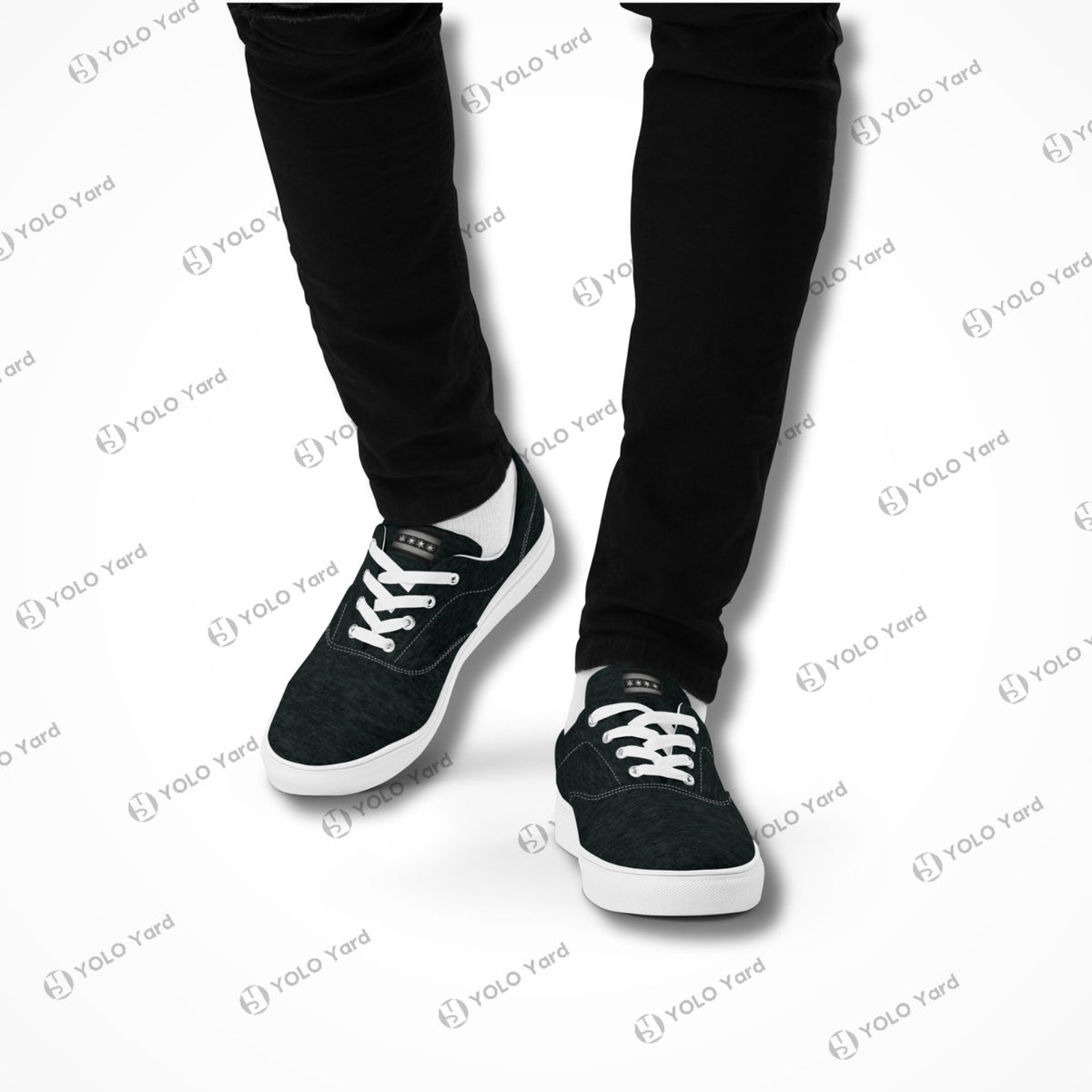 Edgewalker 2 black canvas sneakers worn with black pants, showcasing their trendy and comfortable fit for everyday wear.