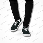 Edgewalker 2 black canvas sneakers worn with black pants, showcasing their trendy and comfortable fit for everyday wear.