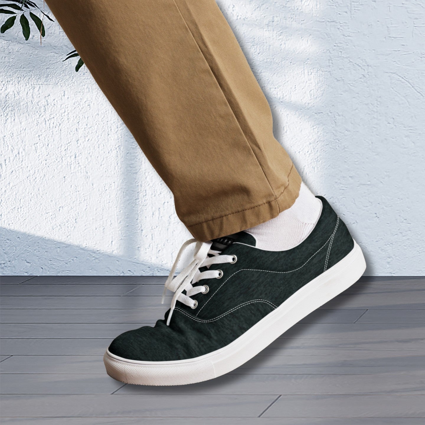 Edgewalker 2 black canvas sneakers styled with beige pants, emphasizing their versatile and casual fashion appeal.