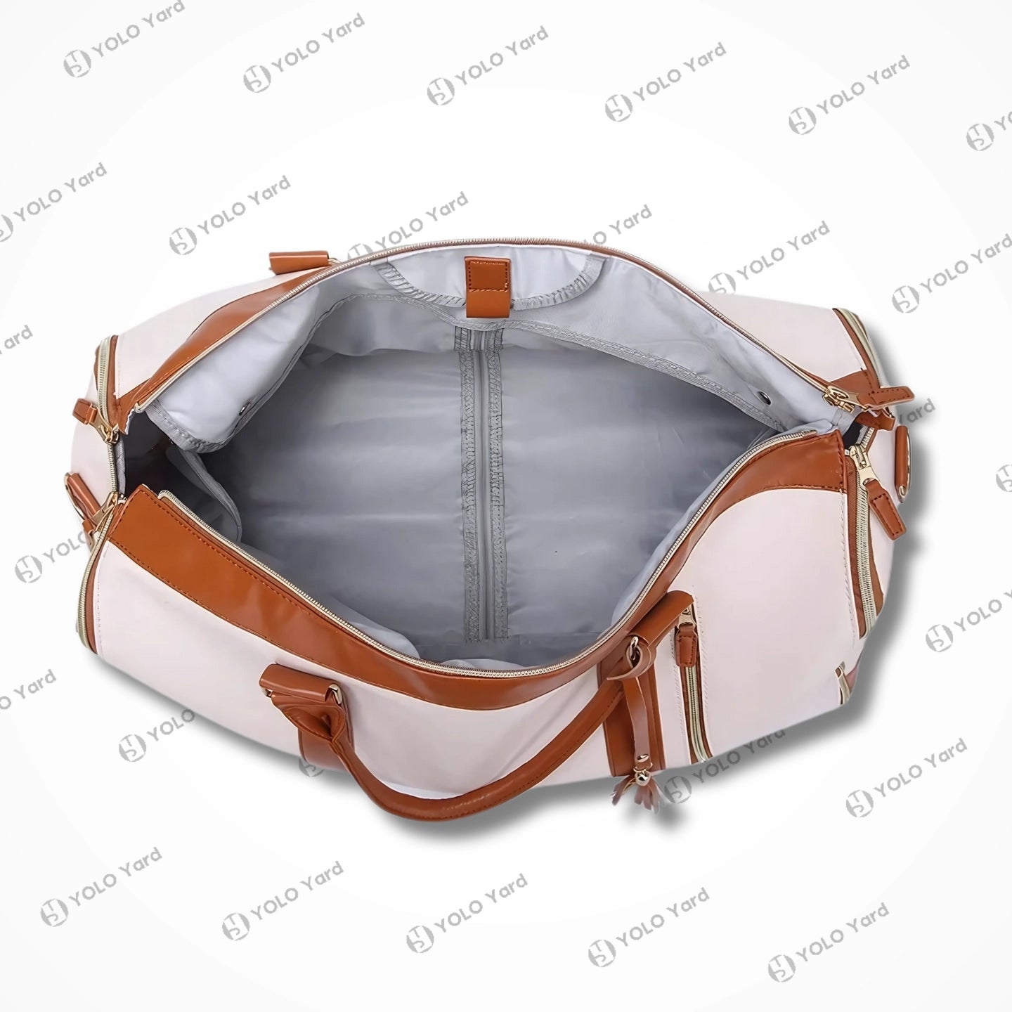 Interior view of Chic-Fold 75L travel duffel bag in white with brown accents, showcasing spacious compartments and zipper pockets.