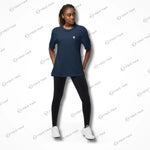 Female model in dark navy Cool-Fit Quick-Dry Athletic Tee Shirt paired with leggings, highlighting its breathable and versatile design.