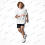 Model wearing white Cool-Fit Quick-Dry Athletic Tee Shirt while running, showcasing its lightweight and quick-dry properties.