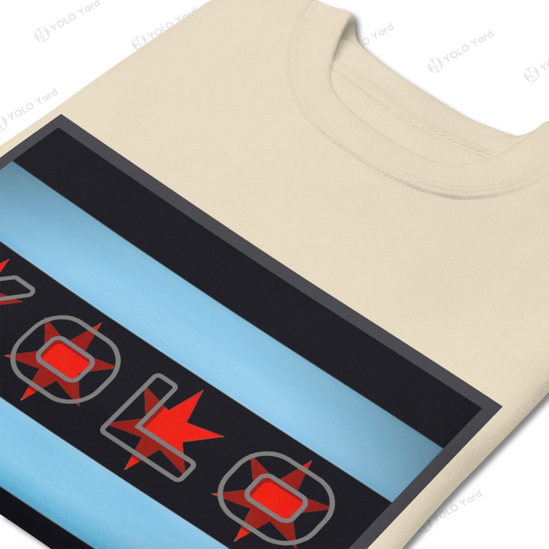 Close-up of the YOLO-Chicago Flag Ultra-Soft Premium Crew Sweater featuring a bold Chicago flag design with red stars and blue stripes on a beige fabric.