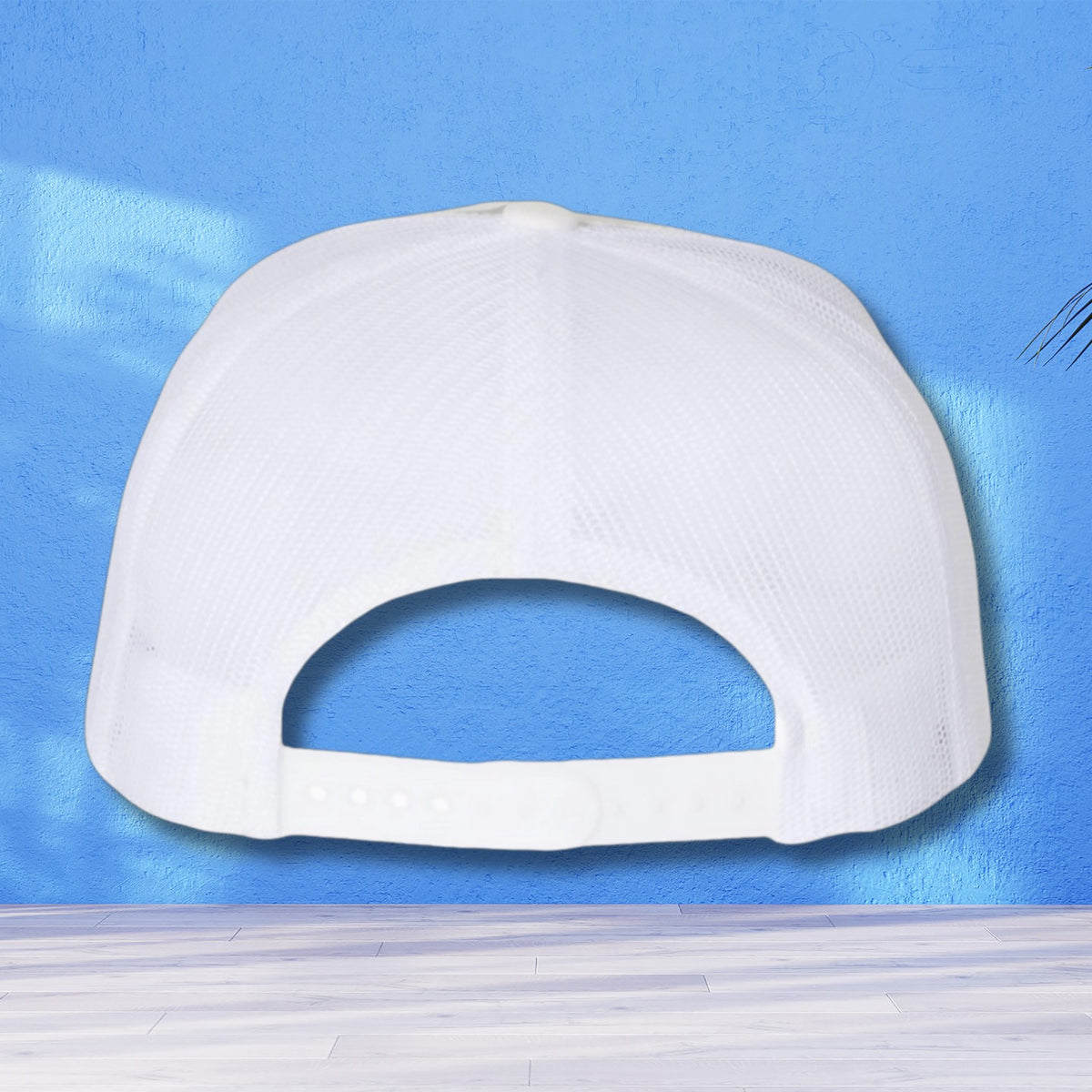 Back view of the Alpine White Multi-Camo Trucker Hat with adjustable snapback closure and breathable mesh design.