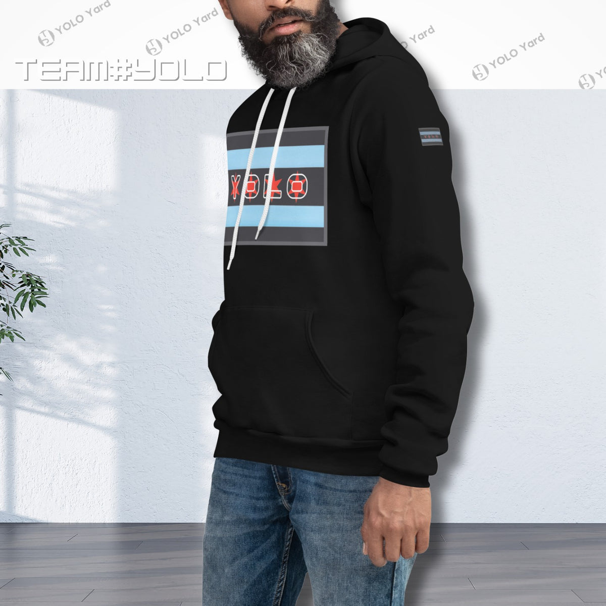 Black pullover hoodie modeled by a man, showcasing the YOLO-Chicago Flag design with Chicago flag stripes and YOLO branding. Sleek and modern.