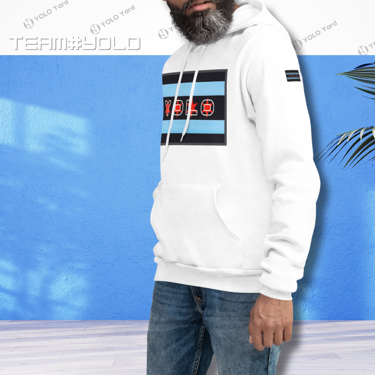 White pullover hoodie modeled by a man, showcasing the YOLO-Chicago Flag design with bold Chicago flag stripes and YOLO branding. Casual and stylish.