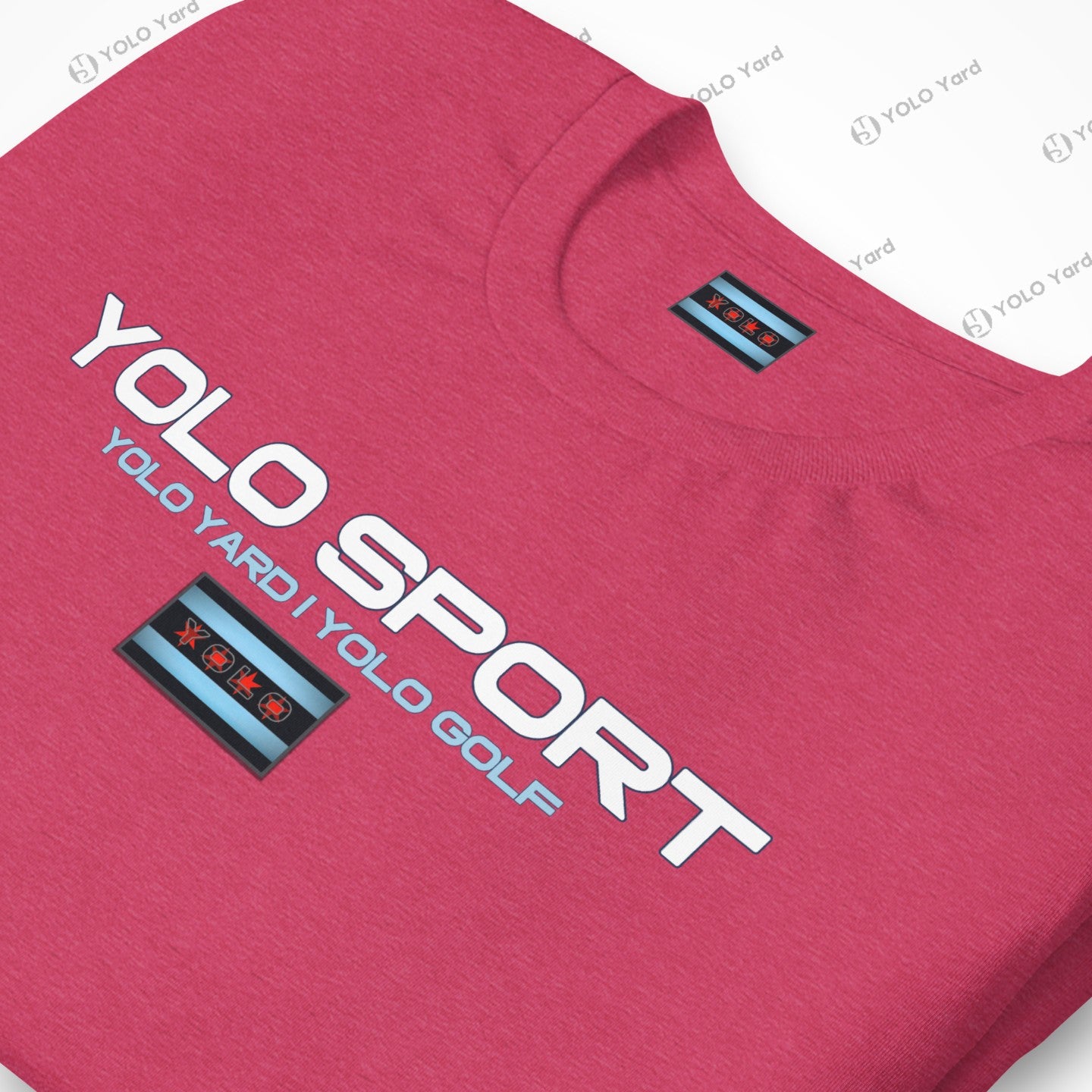 Close-up of a pink YOLO Sport t-shirt showcasing the logo and Chicago flag-inspired design. Soft and stretchy material.