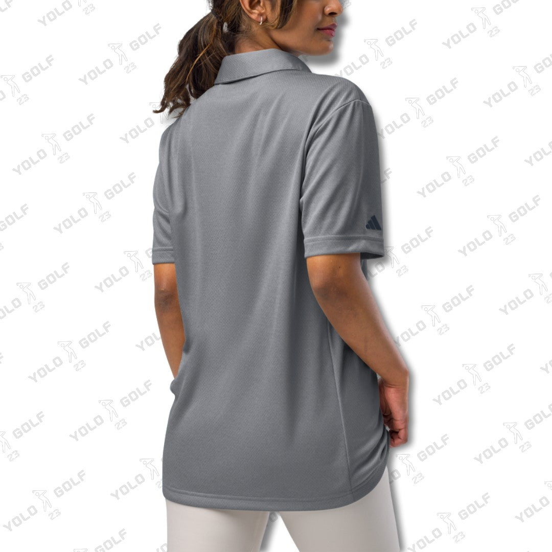 Back view of a woman wearing the space-dyed gray polo shirt from 