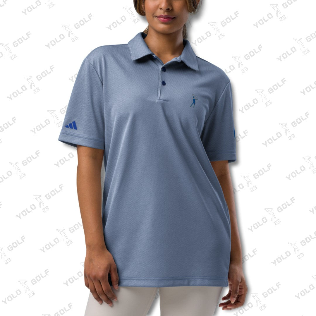 Female model in the signature blue space-dyed polo shirt from 