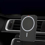 Magnetic wireless car charger securely mounted on a car vent, blending seamlessly with the car's dashboard design.