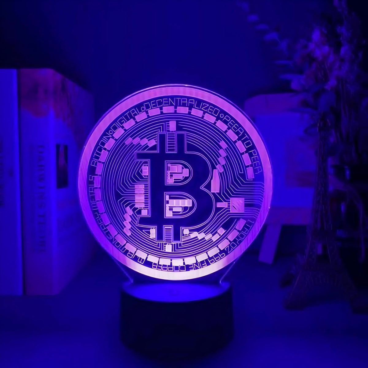 Purple-lit Bitcoin 3D LED desk lamp, adding a vibrant and modern touch to home or office decor.