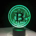 Green-lit Bitcoin 3D LED desk lamp with intricate Bitcoin design, a unique and modern home decor item.