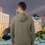 Pigment-dyed vintage tri-blend zip hoodie from Team YOLO in olive green. Soft, preshrunk, and durable, offering a stylish and comfortable fit.