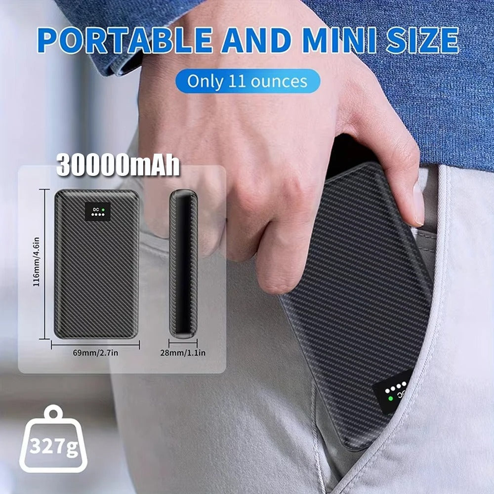 Portable 30000mAh power bank with compact size and lightweight design, fitting easily into a pocket.