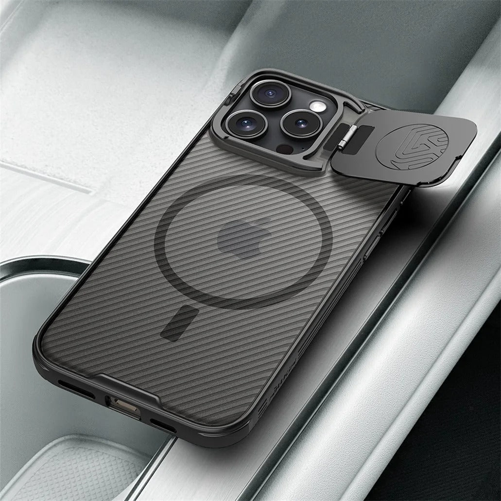 Black CamShield Prop iPhone 16 case with carbon texture and lens stand, shown on a phone in a car interior. Manufactured by Nillkin, available at 