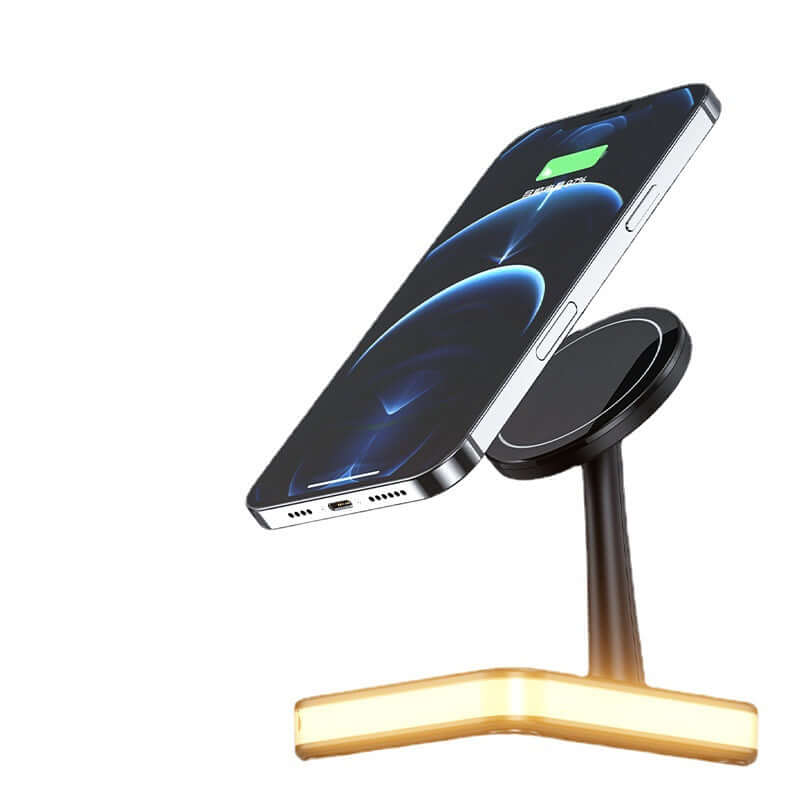 QuadraCharge LED Dock with magnetic stand holding a phone upright. Warm LED base and 30W fast wireless charging capability.