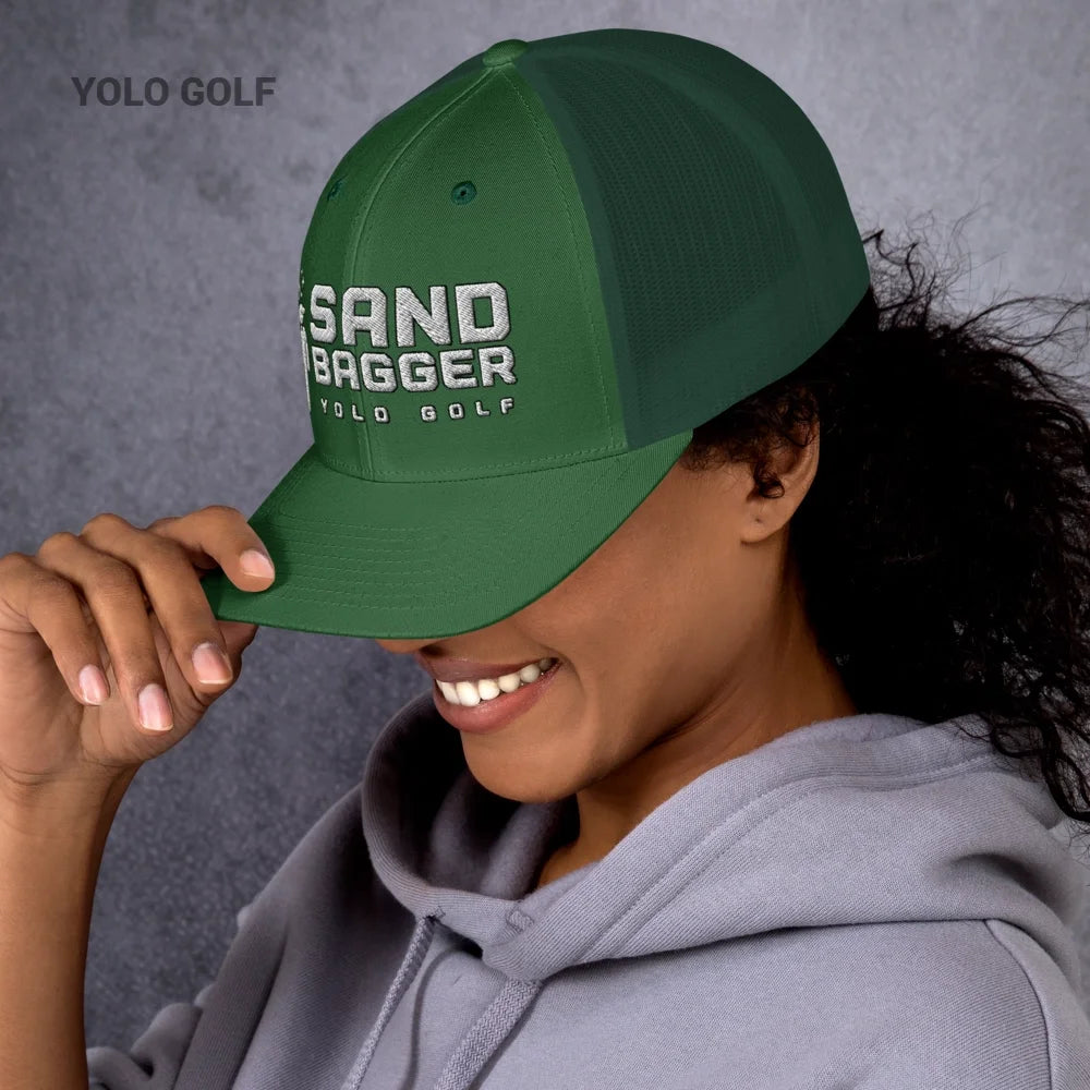 White Sandbagger trucker hat worn by a man, highlighting its 