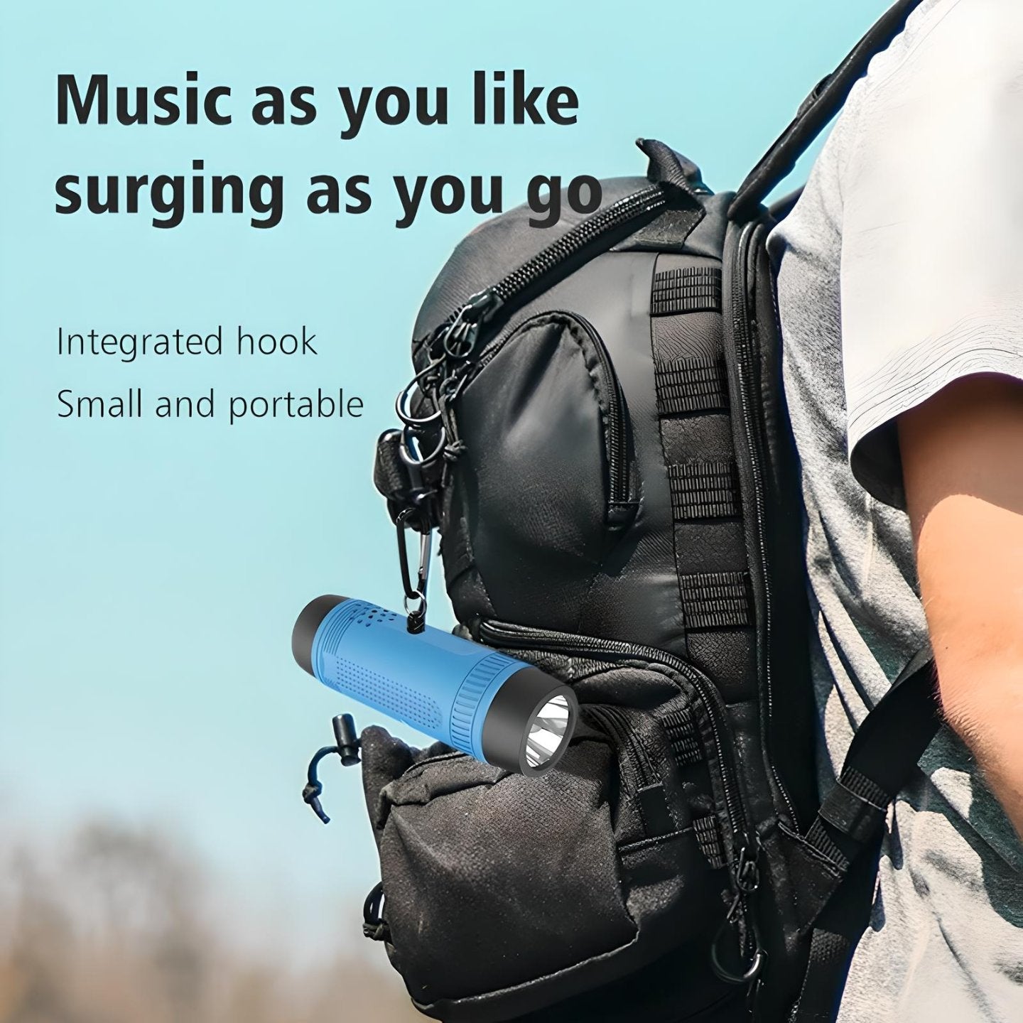 Zealot S1 Bluetooth speaker attached to a backpack with an integrated hook, showcasing its portability for outdoor use.