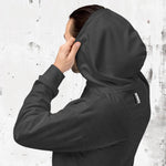 Man adjusting hood of 'Swing23' charcoal hoodie from 