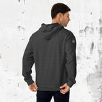 Man wearing 'Swing23' charcoal hoodie from 