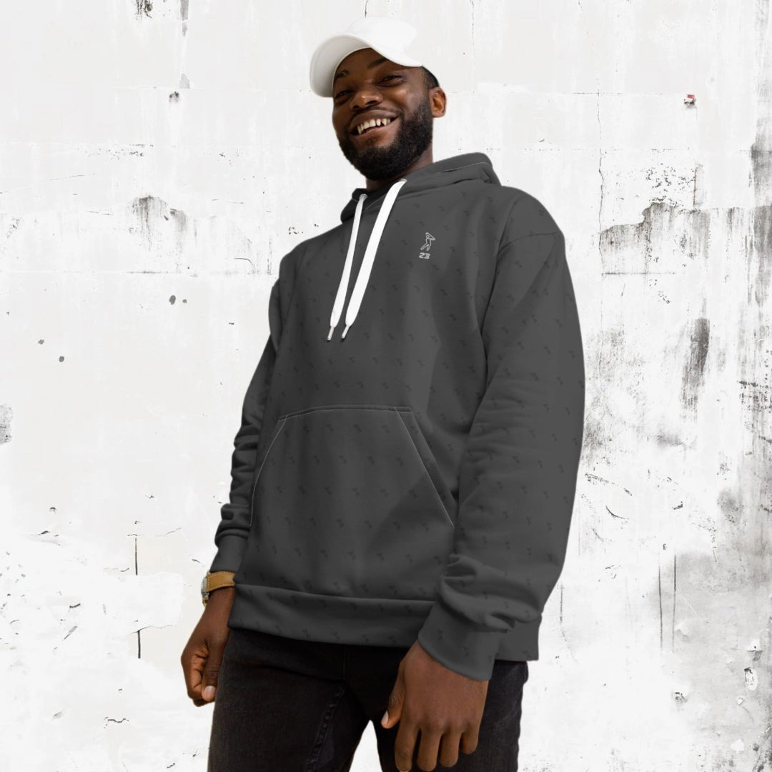 Smiling man wearing 'Swing23' charcoal hoodie from 