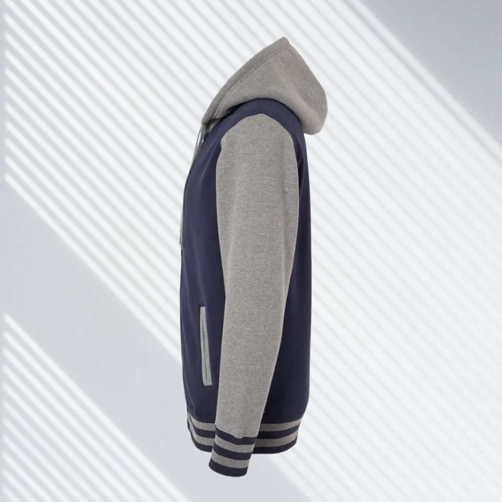 Side view of navy and gray varsity zip hoodie from 