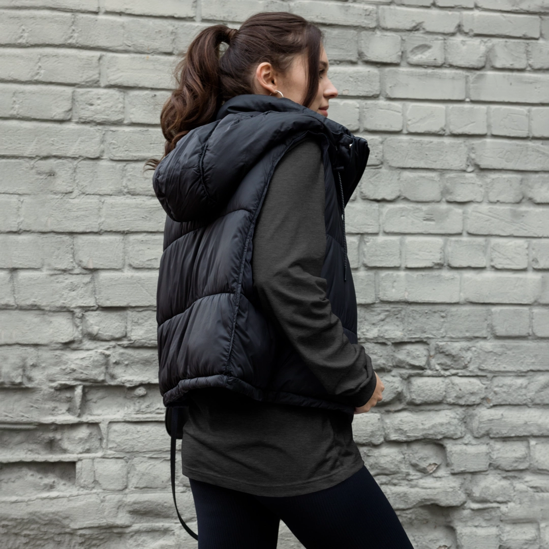 Light gray YOLO-Chicago Flag Long Sleeve Crew T-Shirt styled with a black puffer vest, featuring a bold red 