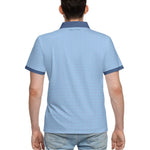 Rear view of a model wearing the 'Out of Office' Blue Dream Polo Shirt by YOLO Golf Sportswear, highlighting the eco-friendly material and minimalist branding.